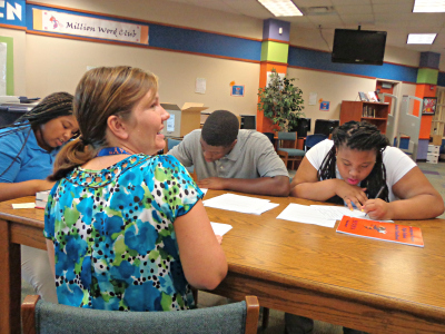 Amanda Bostick meets with CIS students at Lexington Senior High School to get acquainted and start the 2013/14 school year off on the right foot.